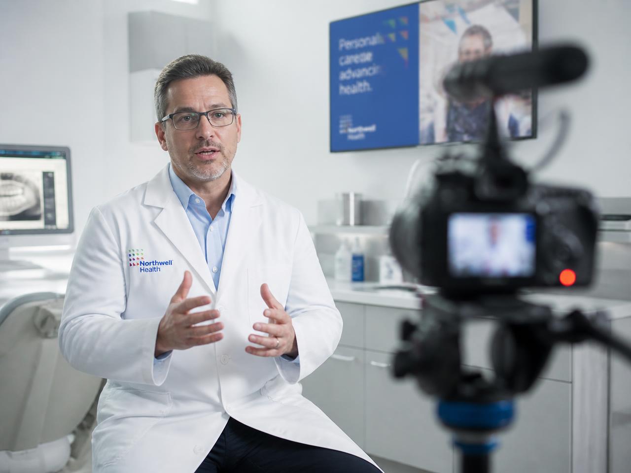 Healthcare video production: physician interview filmed in a modern clinic